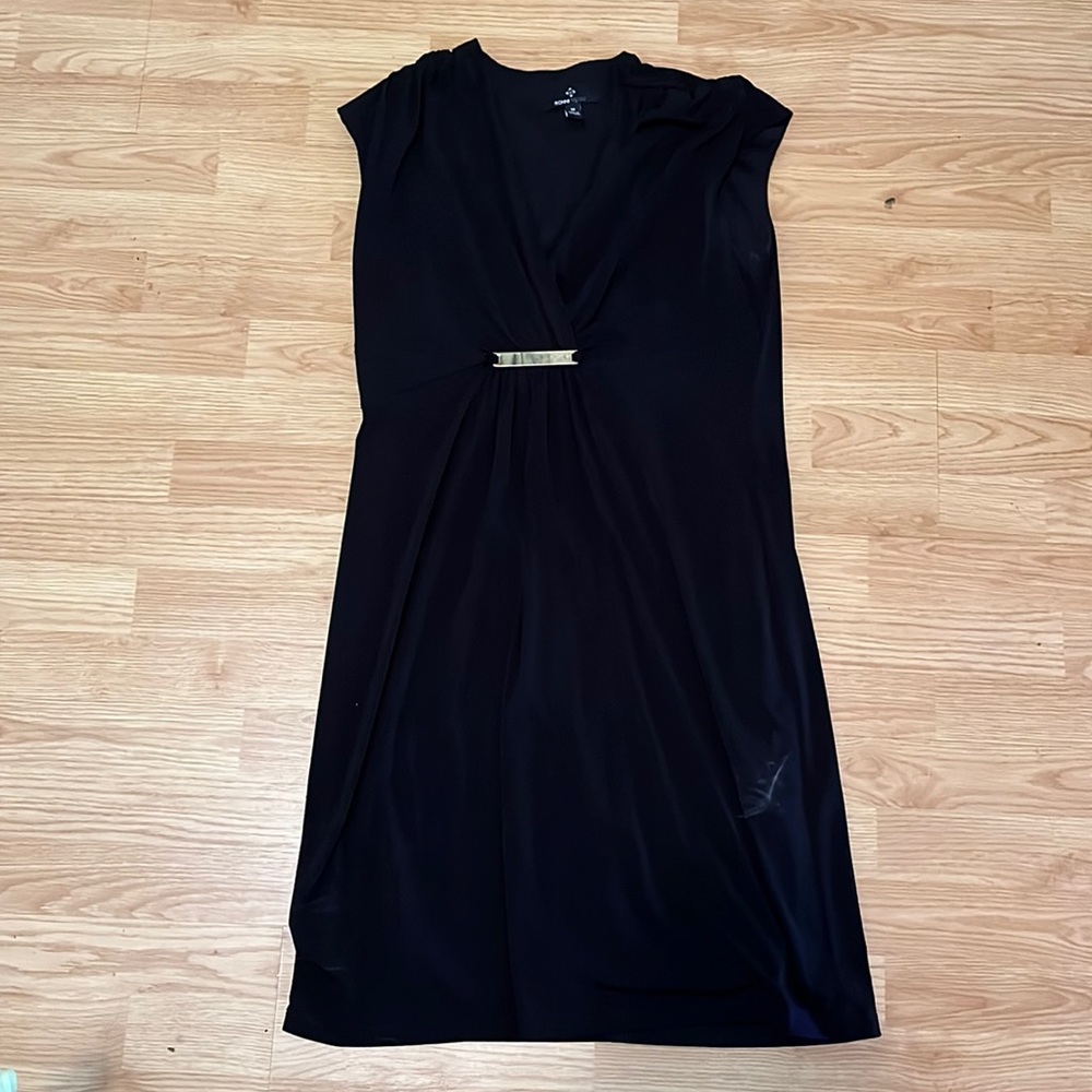 Little black dress by Ronni Nicole! Cute synched waist with metal accessory.